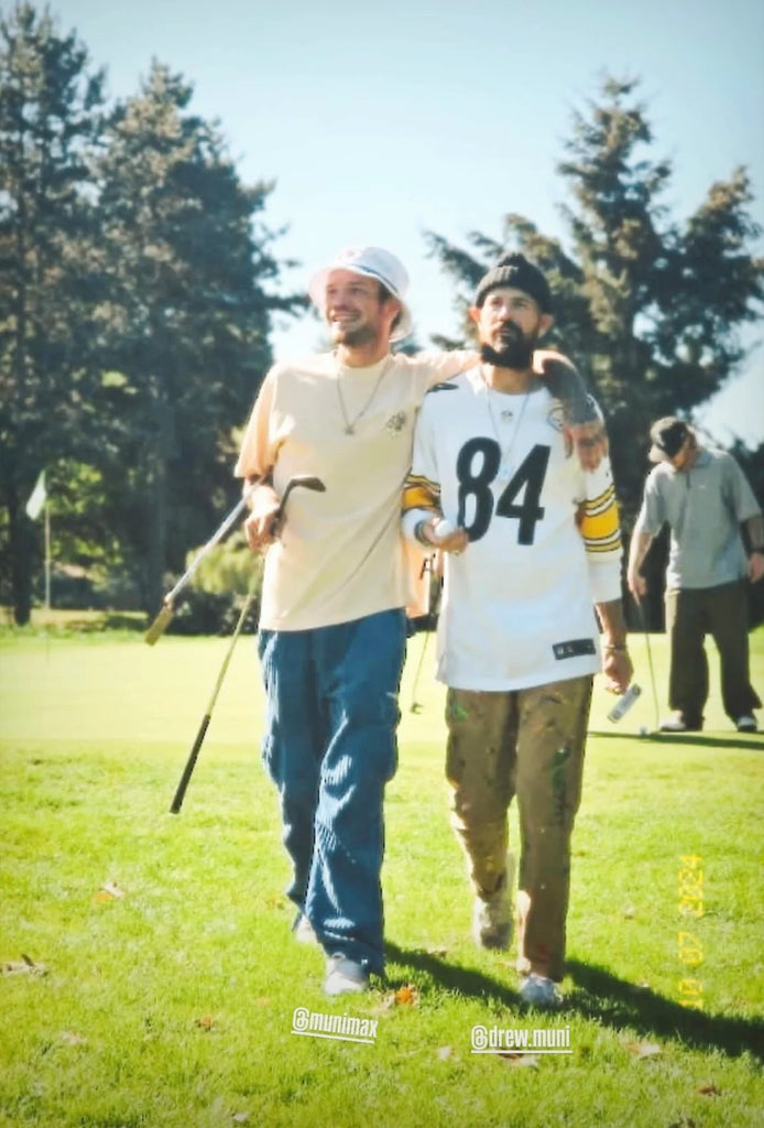 Max and Drew Reinland playing golf