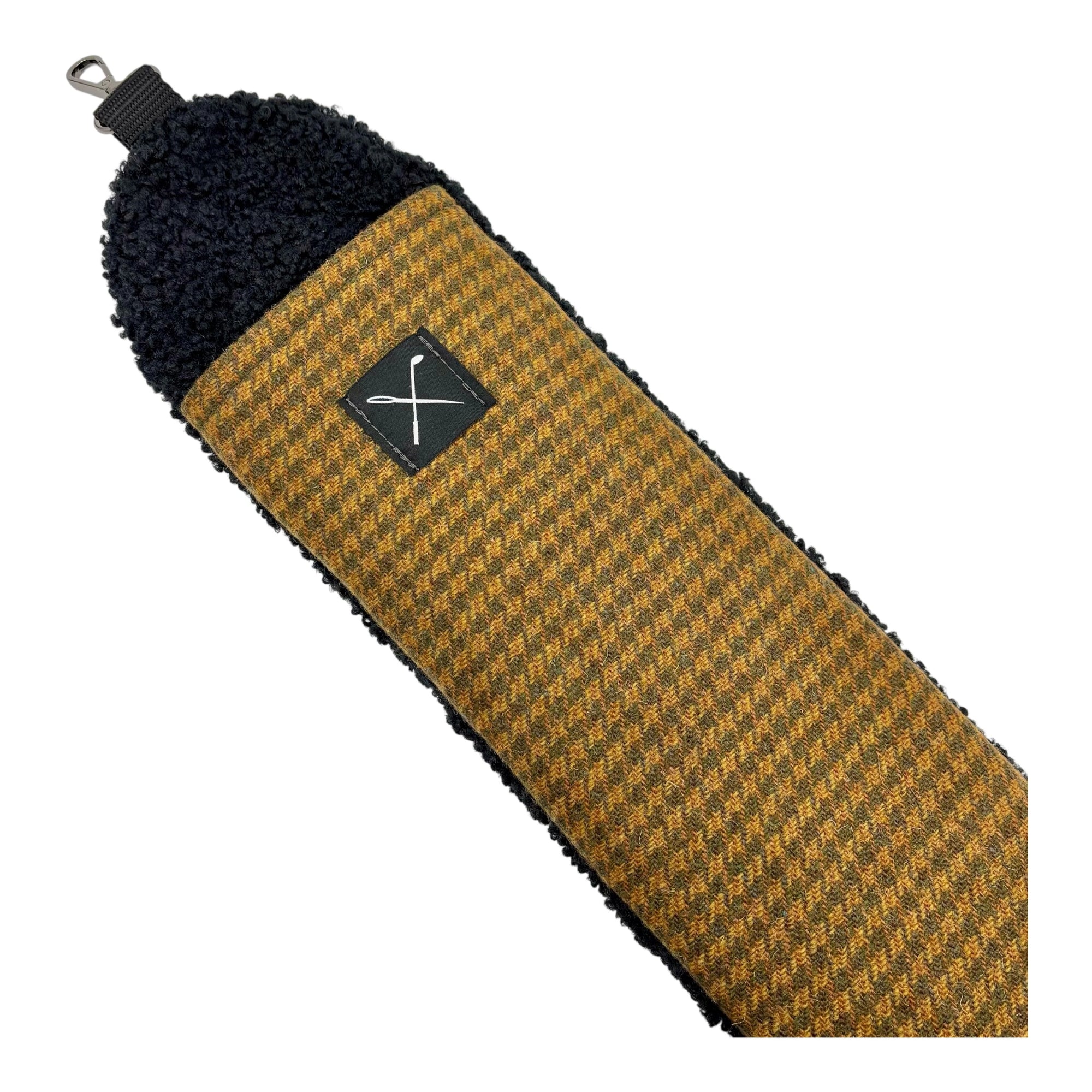 Textured brown and black strap with a logo on a white background