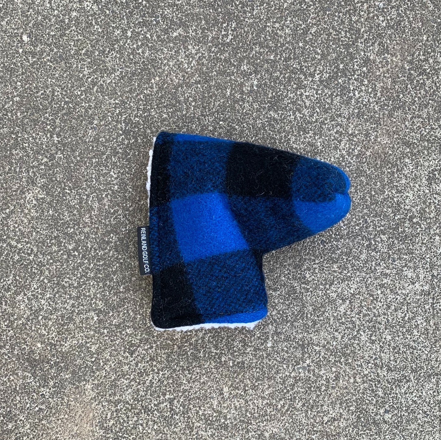 blue and black shearling lined putter cover