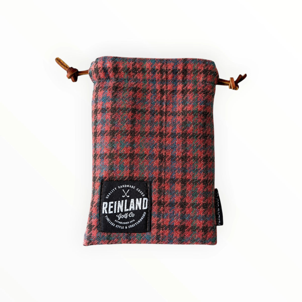 Plaid drawstring pouch with Reinland Golf Co. branding on a white background