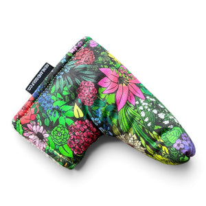 A golf putter headcover featuring a vibrant tropical floral print with pink, red, green, and blue flowers on a black background, shown on a clean white background.