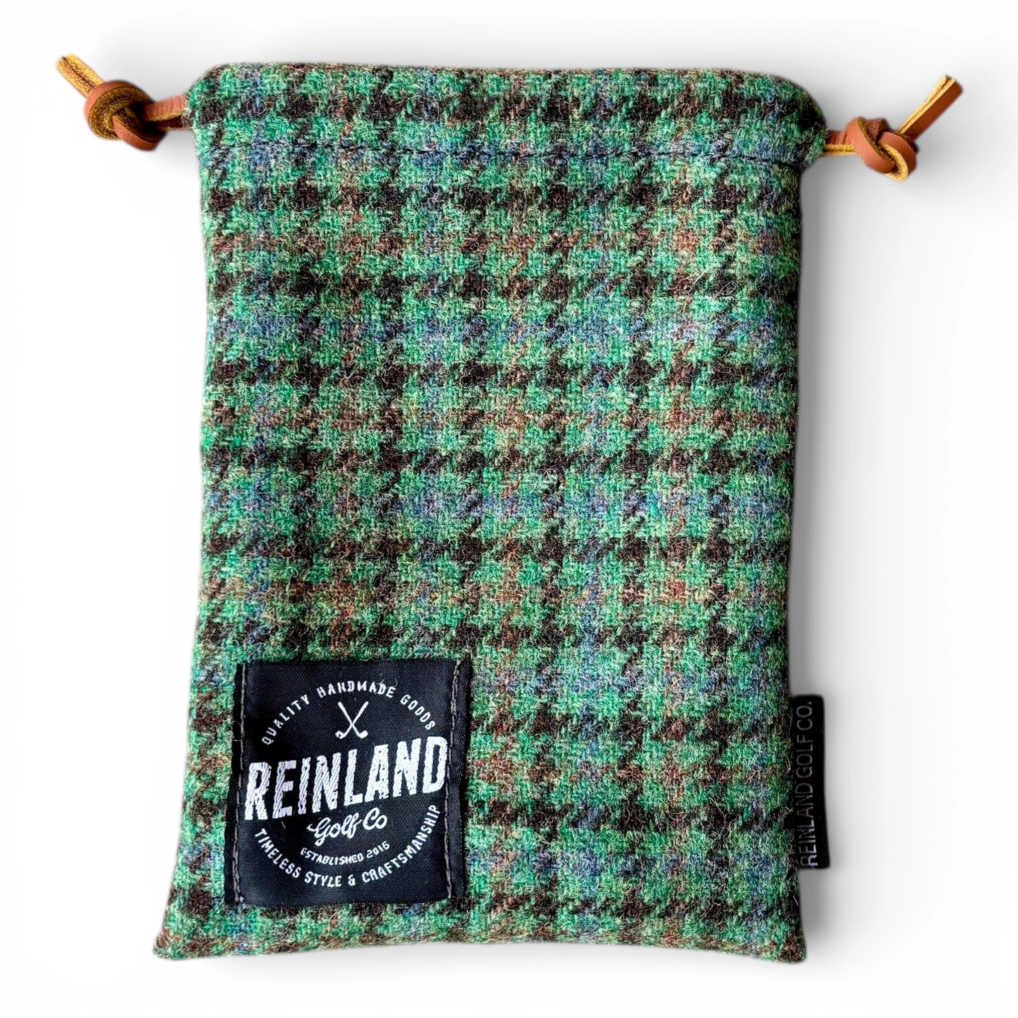Green plaid pouch with 'Reinland Golf Co' label on a white background