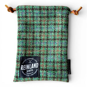 Green plaid pouch with 'Reinland Golf Co' label on a white background