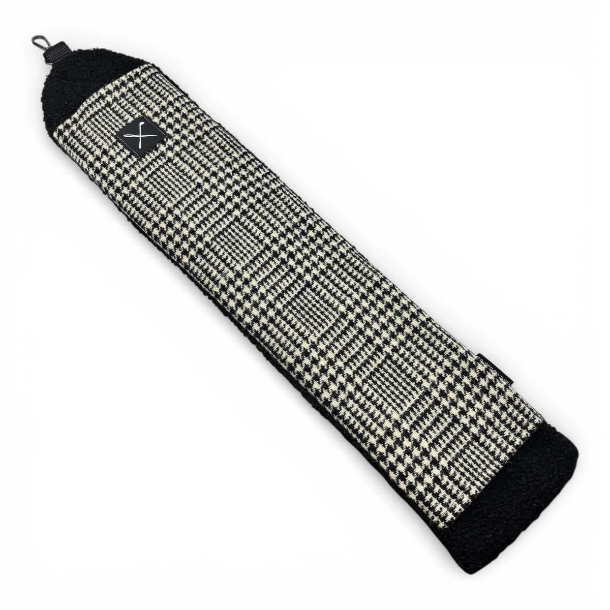 Black and white houndstooth patterned product on a white background