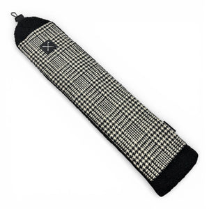 Black and white houndstooth patterned product on a white background