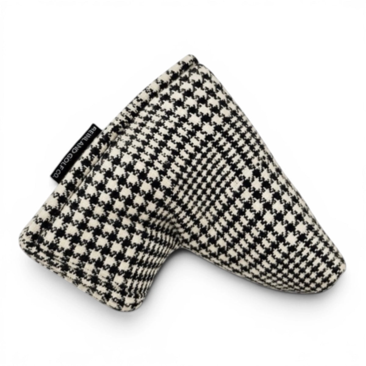 Houndstooth patterned golf club head cover on a white background