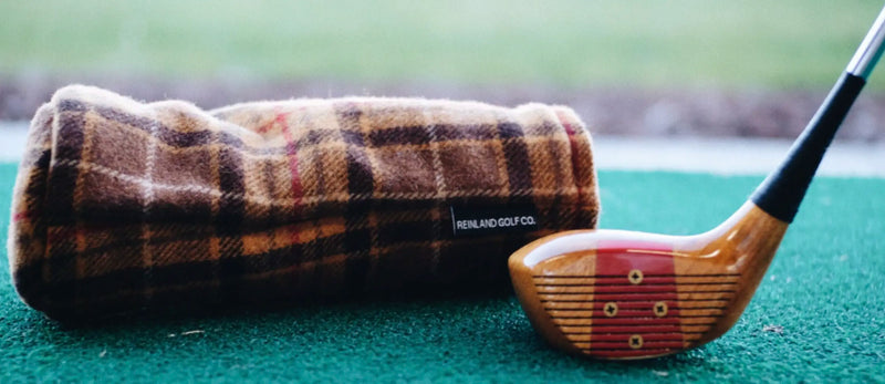 brown plaid headcover and persimmon club