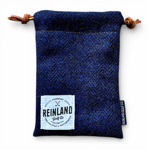 Blue textured drawstring bag with 'Reinland Golf' label on a white background